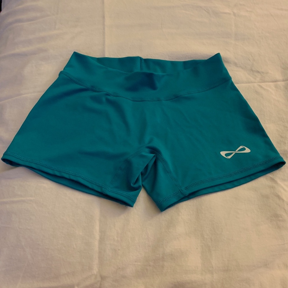 Teal gym shorts.